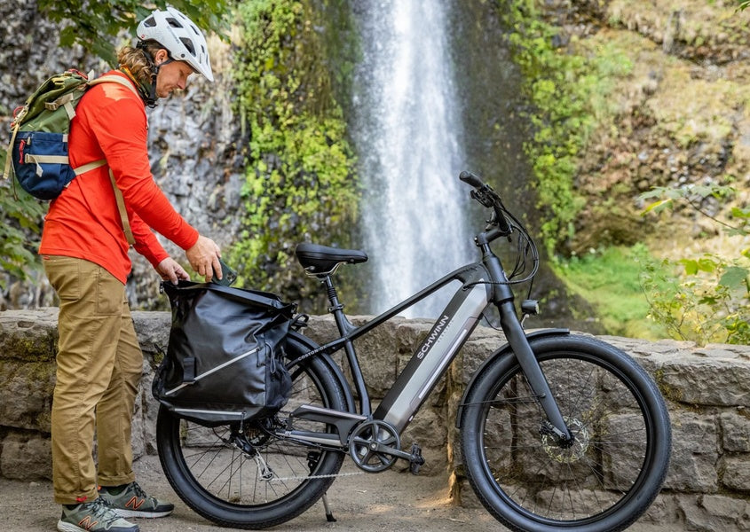 Man performing a pre-ride check before going on a bike ride.